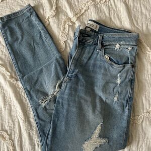 Distressed Blue Denim Jeans